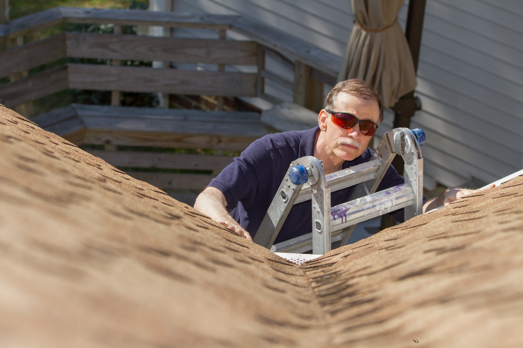 Professional roofer conducting a roof inspection in Walnut Creek